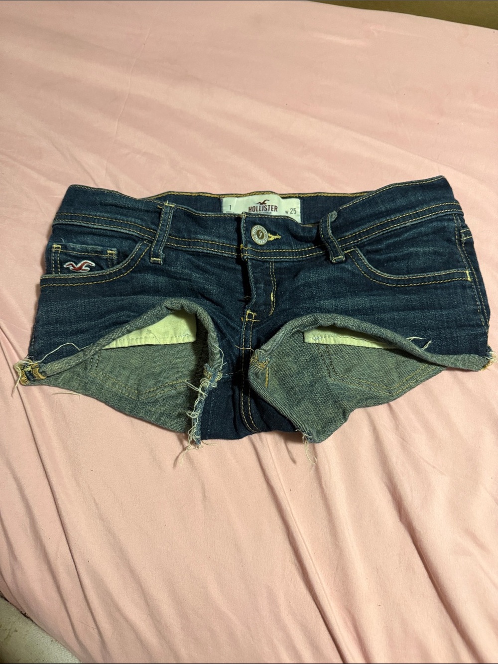 Hollister Women's Dark Blue Denim Cutoff Shorts with Frayed Hem
